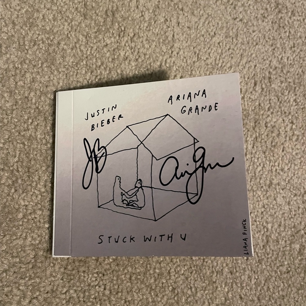 Justin Bieber and Ariana Grande signed stuck with u cd
